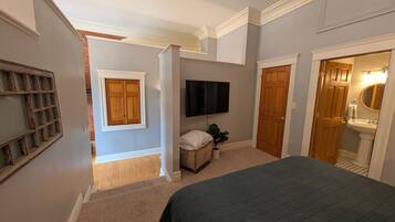 1 bedroom, desk, iron/ironing board, travel crib