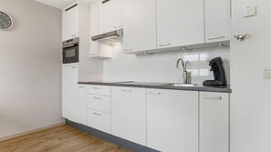 Fridge, dishwasher, coffee/tea maker, electric kettle