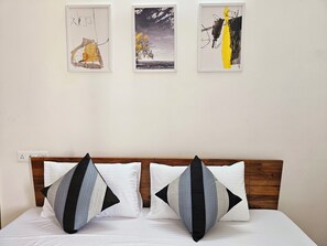 Hypo-allergenic bedding, desk, laptop workspace, rollaway beds