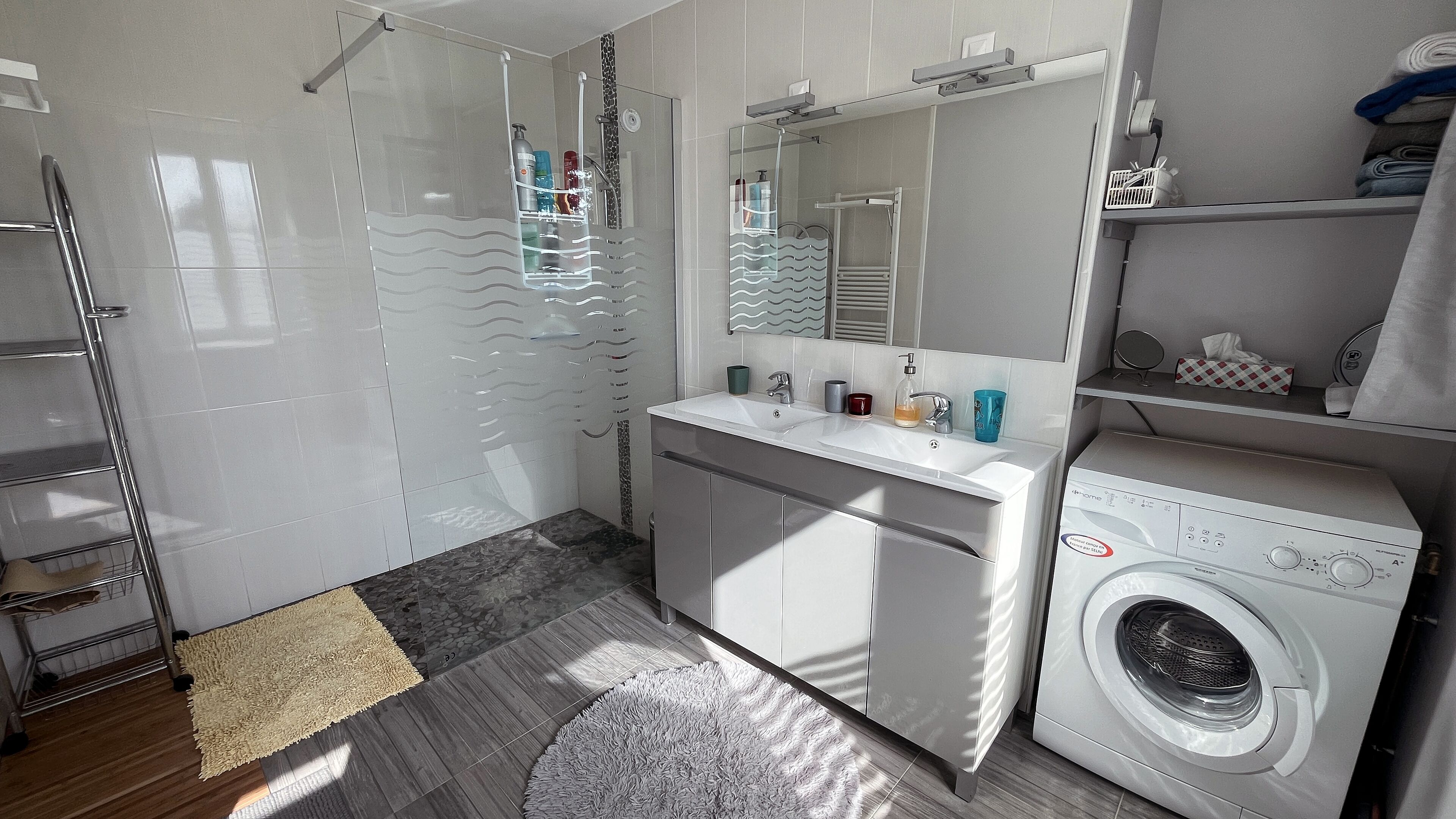 Shower, hair dryer, towels, toilet paper