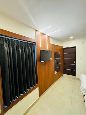 Blackout curtains, iron/ironing board, free WiFi