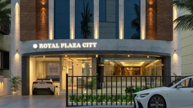 A modern building with the sign "ROYAL PLAZA CITY" at the top. - Royal Plaza City (Kozhikode)