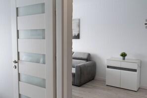 Apartment, Balcony | Living area - RentPlanet - Apartament przy Lotnisku (Poznań)