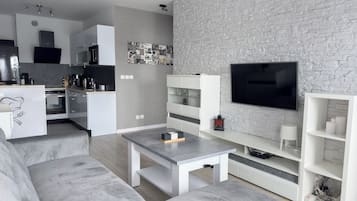 Apartamento, sacada | Ferros/tábuas de passar roupa, Wi-Fi de cortesia