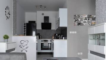 Apartment, Balcony | Private kitchenette | Electric kettle