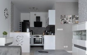 Apartment, Balcony | Private kitchenette | Electric kettle - RentPlanet - Apartament przy Lotnisku (Poznań)