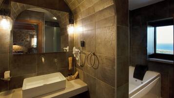 Anemos Tower Suite | Bathroom | Separate bathtub and shower, hair dryer, slippers, towels