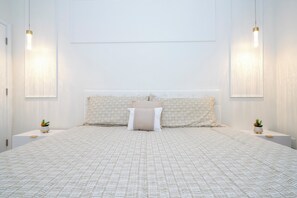 4 عدّة غرف نوم ومكواة/لوح كي وخدمة الإنترنت وملاءات أسرّة