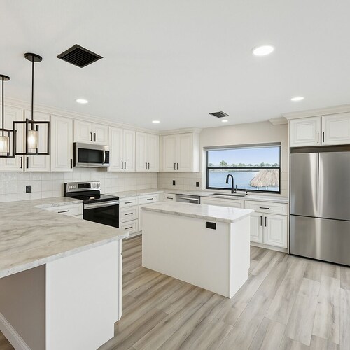 Waterfront Villa with Gulf-Access, Heated Pool, Hot tub, Tiki, Game room & More