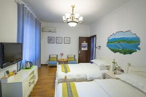 A hotel room with two beds, a TV, a desk, a chair, and a painting on the wall. - Aben Guesthouse (Chun'an)