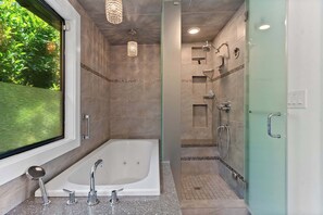 Shower, hair dryer, towels, shampoo