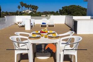 Outdoor dining - #315 Apartamento Turístico Balaia by Home Holidays (Albufeira)