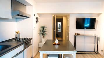 Sensational Sanctuary: 1BR Suite in Ningyocho | Private kitchen | Full-size fridge, microwave, oven, stovetop