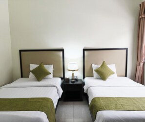 Standard Twin Room, Private Bathroom | In-room safe, desk, laptop workspace, iron/ironing board - Milan Hotel By JK6 (Phnom Penh)