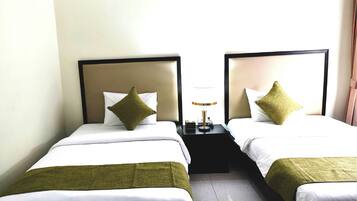 Standard Twin Room, Private Bathroom | In-room safe, desk, laptop workspace, iron/ironing board