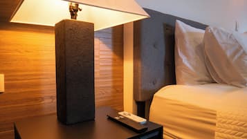 Premium bedding, blackout curtains, iron/ironing board, free WiFi