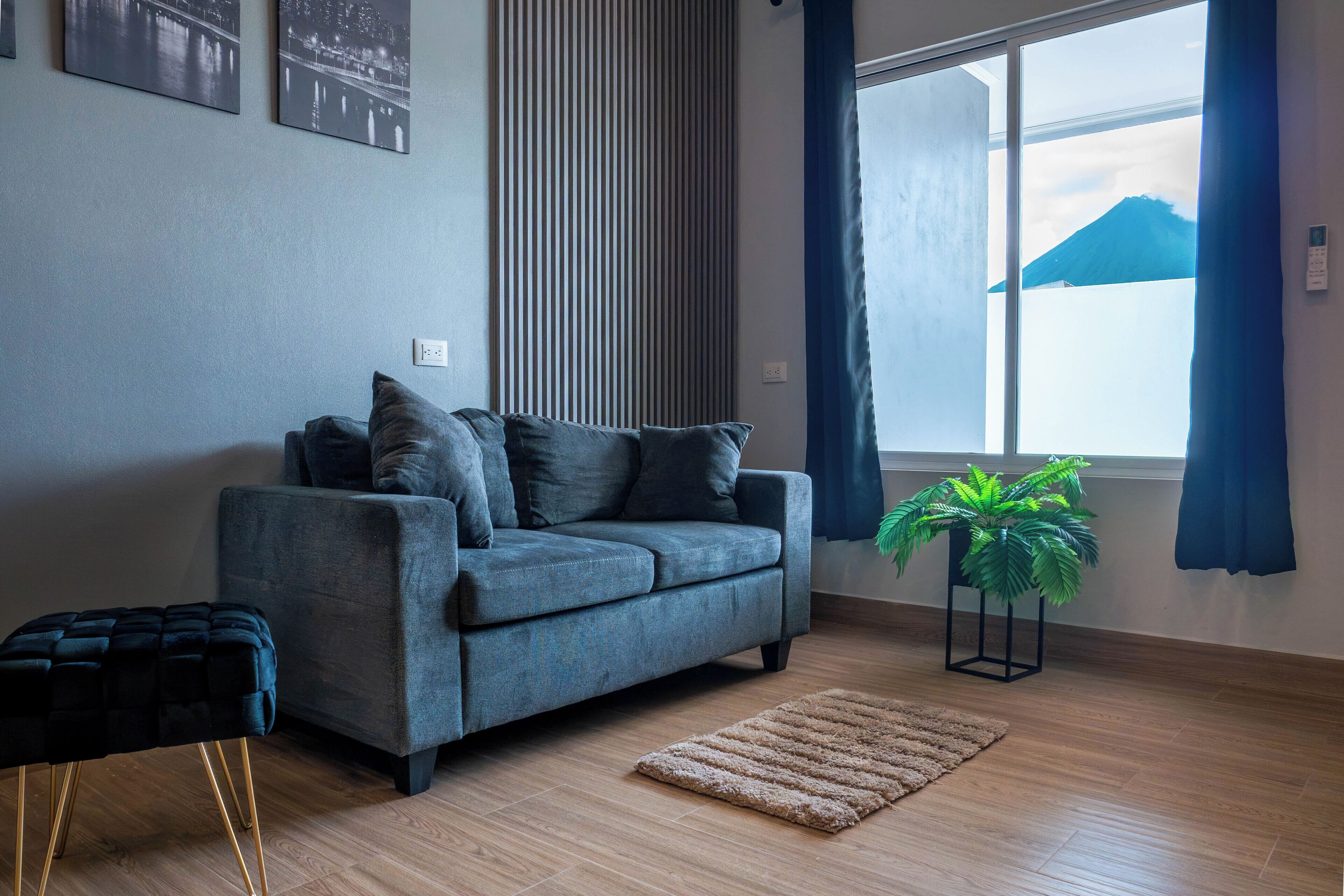 Comfort Apartment | Living area | 42-inch Smart TV with cable channels