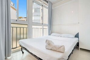 2 dormitorios, tabla de planchar con plancha, wifi y ropa de cama