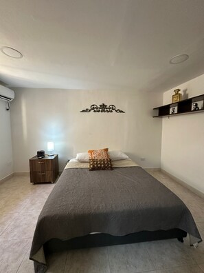 Room 2 | Down comforters, desk, laptop workspace, iron/ironing board - Our House  (Santa Marta)