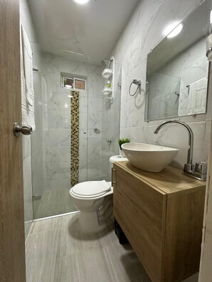 Standard Double Room | Bathroom | Shower, towels, soap, toilet paper