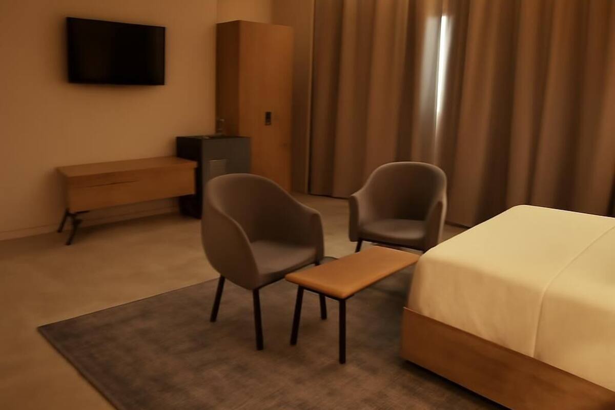 In-room safe, laptop workspace, blackout drapes, soundproofing
