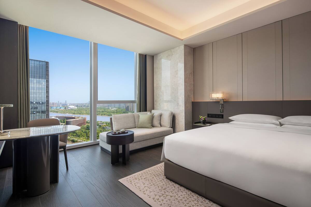 Premium bedding, down comforters, memory foam beds, minibar