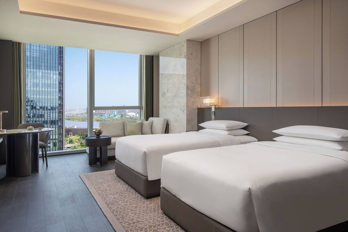 Premium bedding, down comforters, memory foam beds, minibar