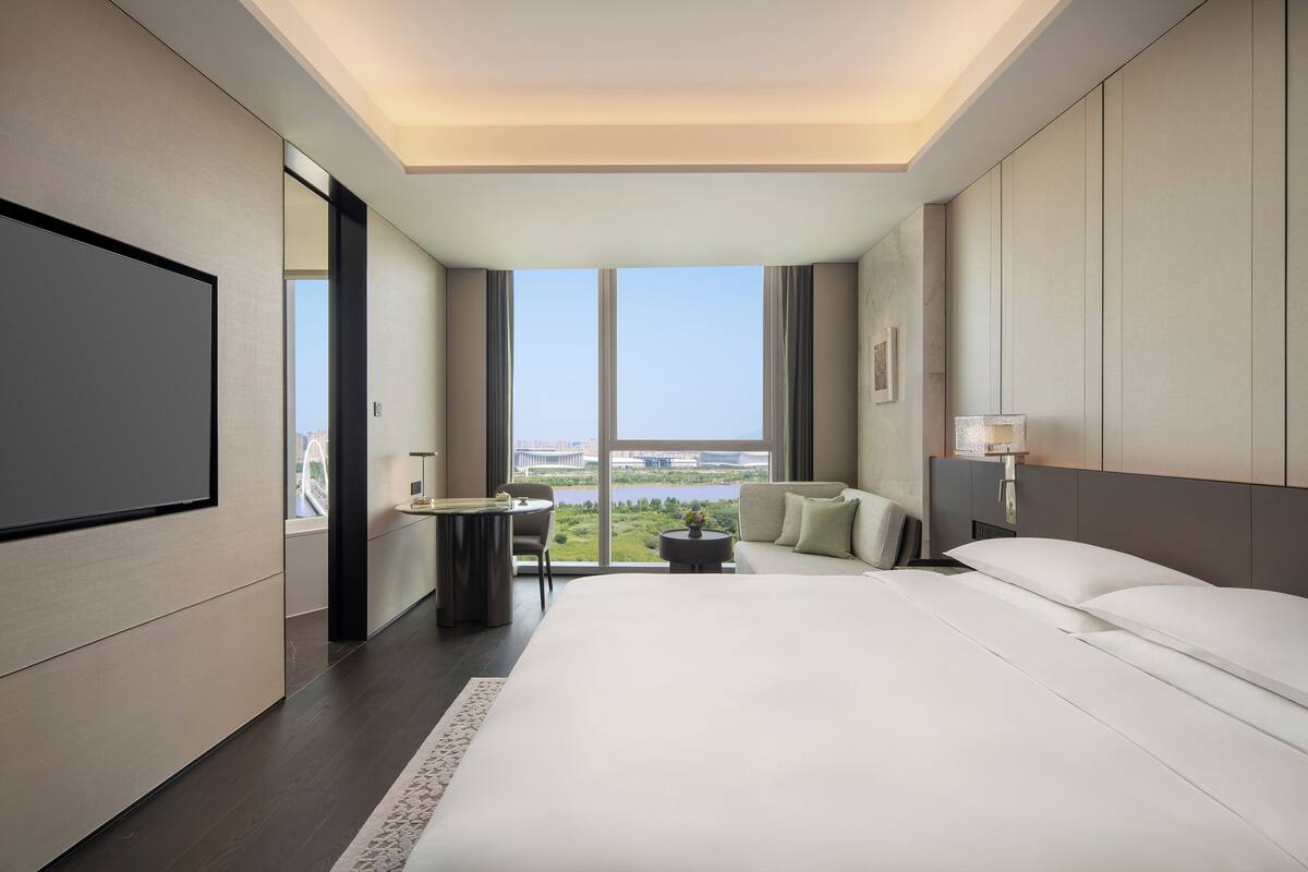 Premium bedding, down comforters, memory foam beds, minibar