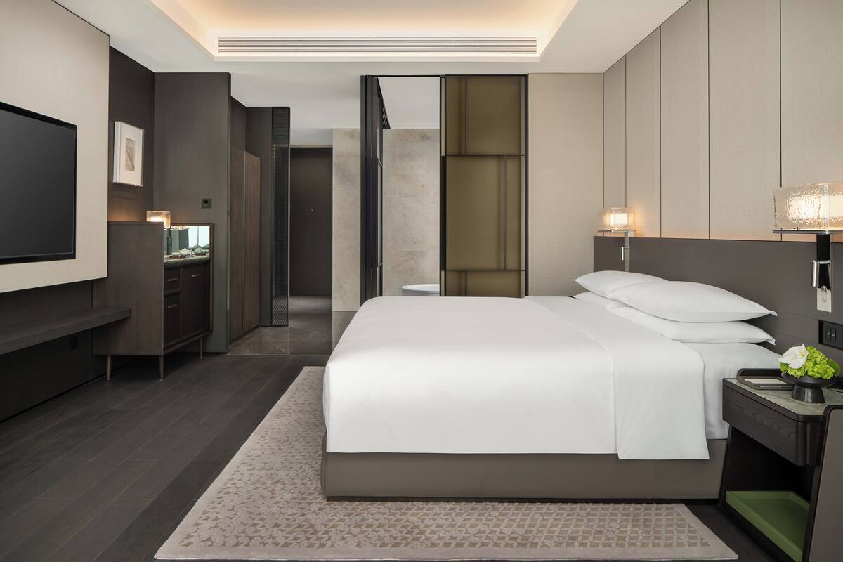 Premium bedding, down comforters, memory foam beds, minibar