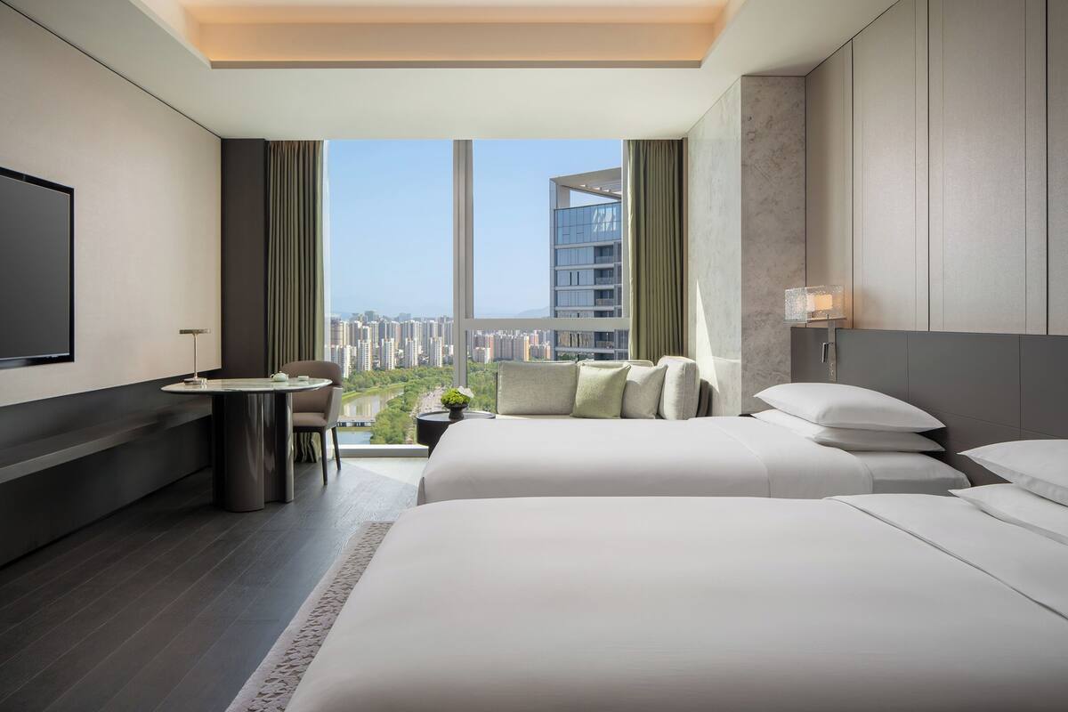 Premium bedding, down comforters, memory foam beds, minibar