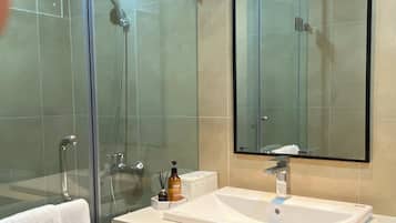 Shower, hair dryer, towels, soap