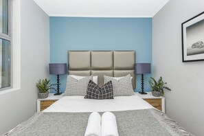 2 chambres, coffres-forts dans les chambres, fer et planche à repasser
