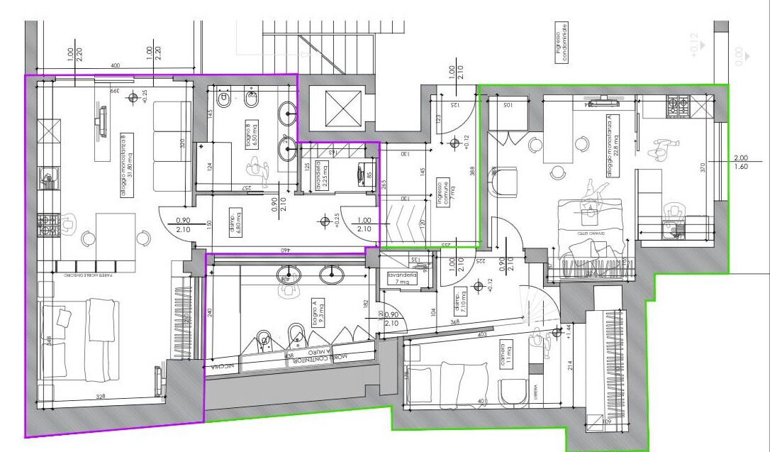 A floor plan of a hotel with multiple rooms, a kitchen, and a bathroom.