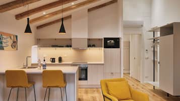 Deluxe Studio, City View | Private kitchen | Fridge, microwave, oven, stovetop