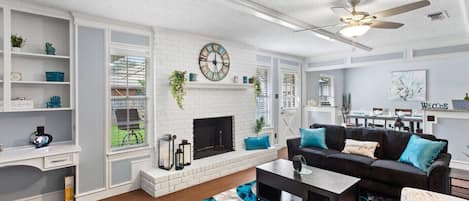 Smart TV, fireplace, books