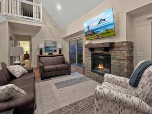 TV, fireplace, books, offices