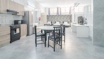 Coffee/tea maker, fridge, microwave, oven