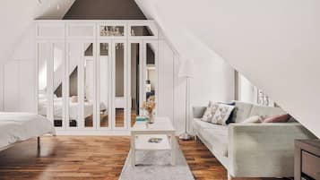 Deluxe-Apartment, 1 Queen-Bett und Schlafsofa, Nichtraucher, Stadtblick | Wohnbereich | 55-Zoll-Smart-TV mit Kabelempfang, Netflix, Hulu