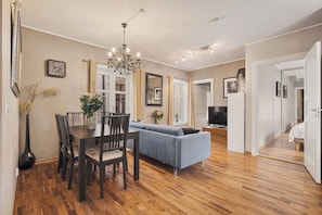 Deluxe Apartment, 2 Bedrooms, Private Bathroom, City View | Living area | 55-inch Smart TV with cable channels, Netflix, Hulu