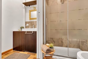 Shower, free toiletries, hair dryer, toilet paper