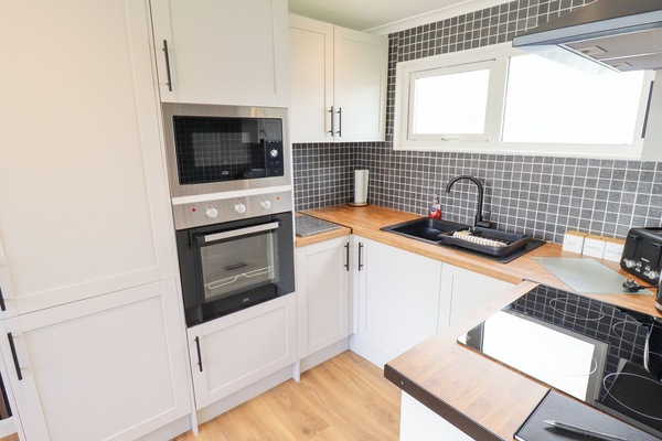 Fridge, microwave, toaster, cookware/dishes/utensils