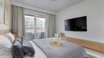 1 habitación, tabla de planchar con plancha, cuna de viaje y wifi