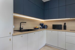 Fridge, microwave, oven, stovetop - Bright Apartment with Balcony | Spa Area and Parking (Dziwnów)