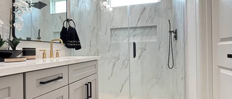 Shower, towels, toilet paper