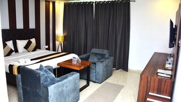 Suite, Balcony, City View | Desk, laptop workspace, free WiFi