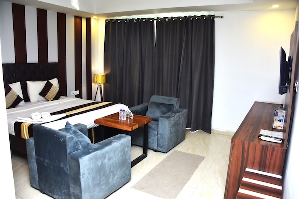 Suite, Balcony, City View | Desk, laptop workspace, free WiFi