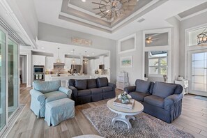 House, Multiple Beds, Pool Access, Pool View (WPS10434) | Living area - 10434 Winnipeg Street (Port Charlotte)