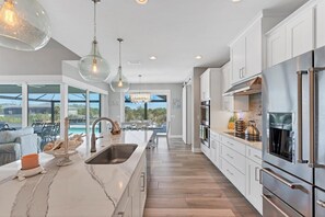 House, Multiple Beds, Pool Access, Pool View (WPS10434) | Private kitchen | Coffee/tea maker - 10434 Winnipeg Street (Port Charlotte)