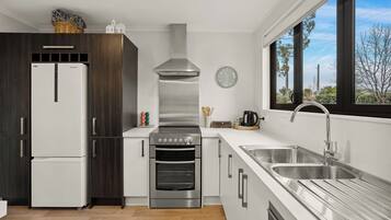 Fridge, microwave, toaster, cookware/dishes/utensils