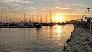 A marina with boats docked at sunset. - Private luxury jacuzzi in Pozos Colorados (Magdalena)